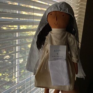 Mary on the mantle doll